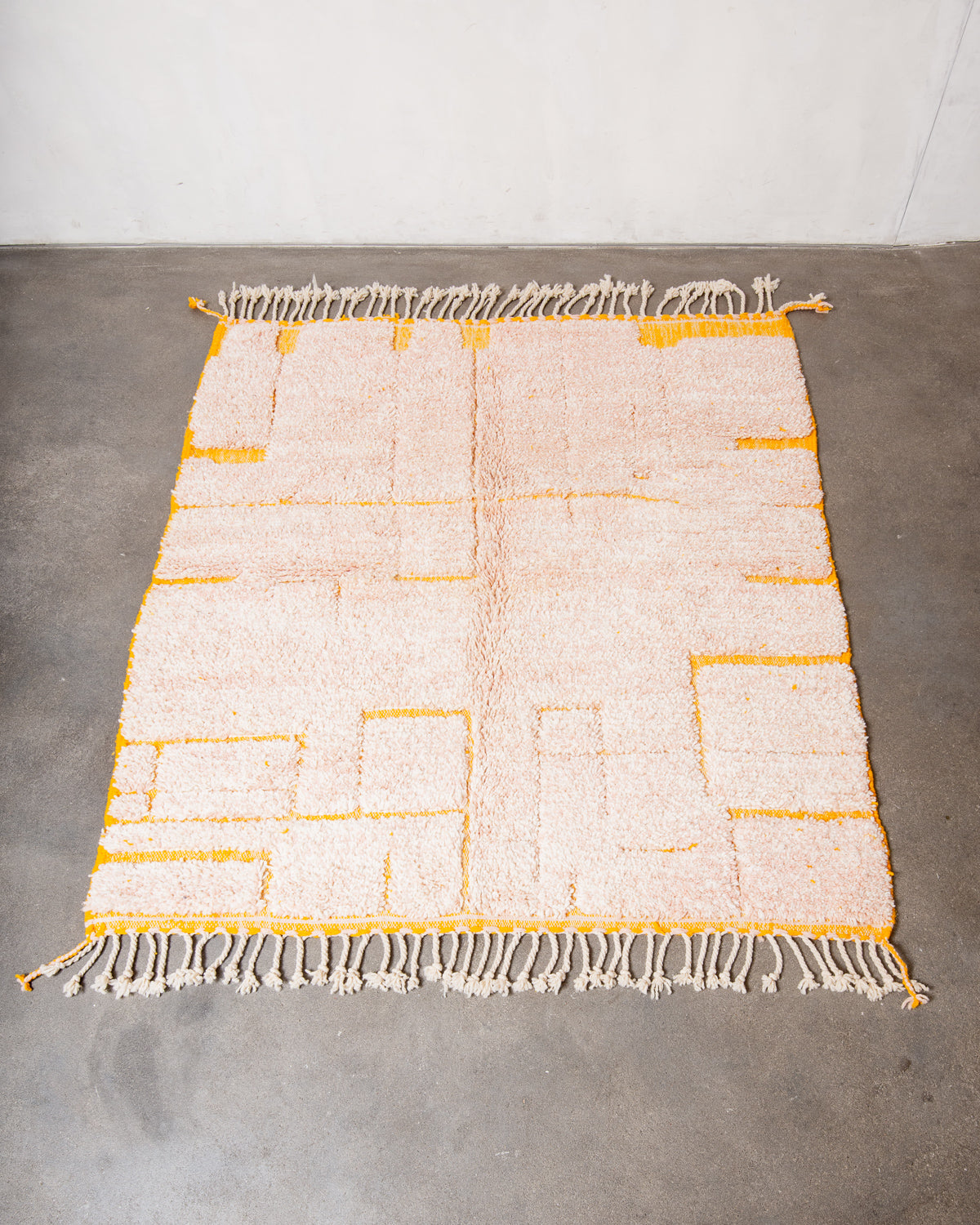Modern, designer, handcrafted Berber rug from Morocco. Beniourain carpet with beautiful colours and patterns and fluffy wool texture.